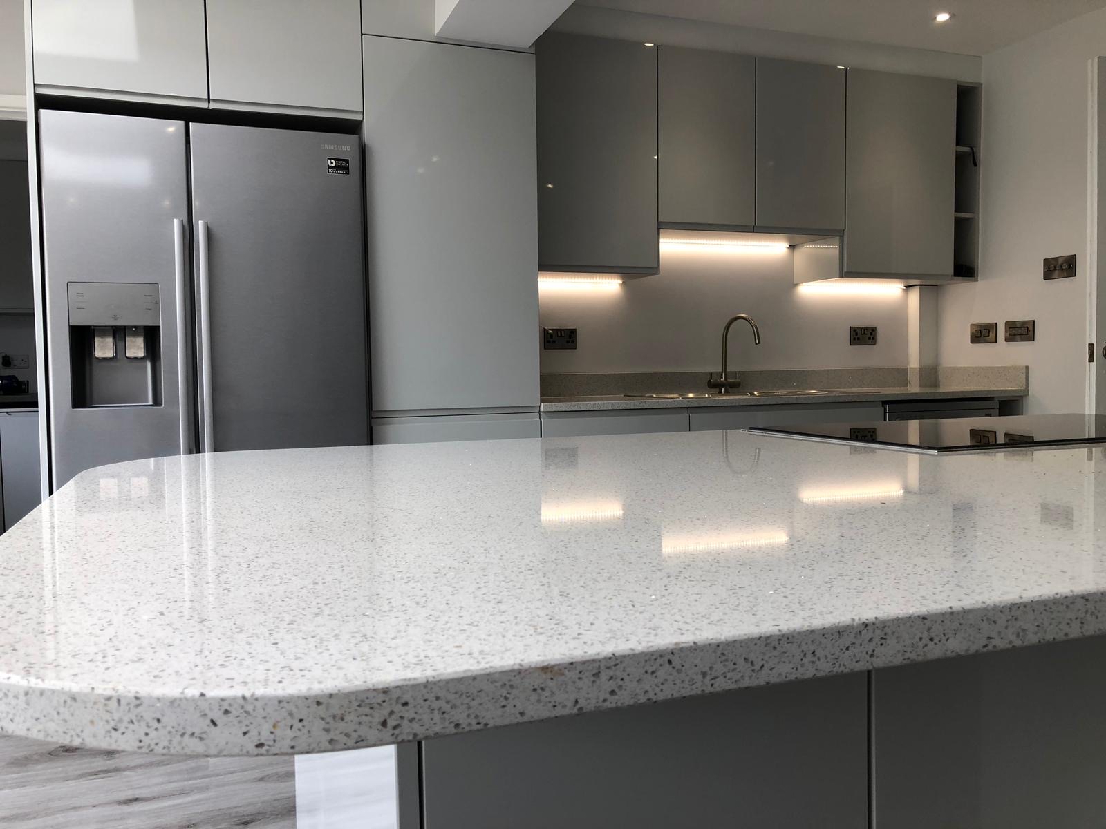 Kitchen grey gloss terrazzo countertop close-up, made and fitted by Sussex Design Interiors